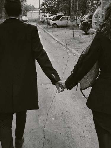 holding hands coupe holding hand during daytime human